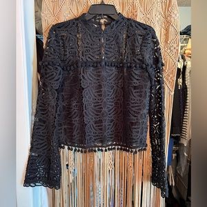 Beautiful crocheted like black top by Tularosa